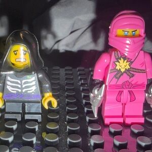 Young Lloyd and Pink Zane Minifigures